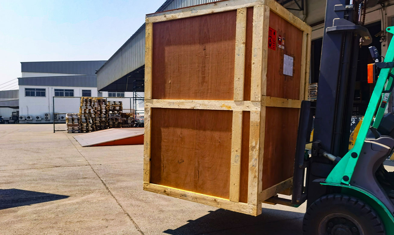 pallet mover taking large package to truck